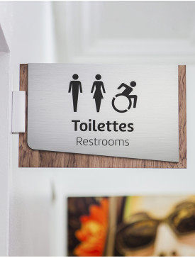 Plaque de toilettes en drapeau